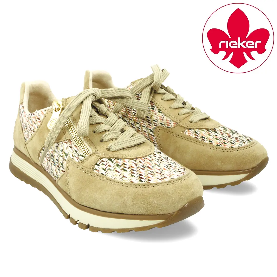 Rieker beige dames sneaker met rits, veters en decoratief patroon.